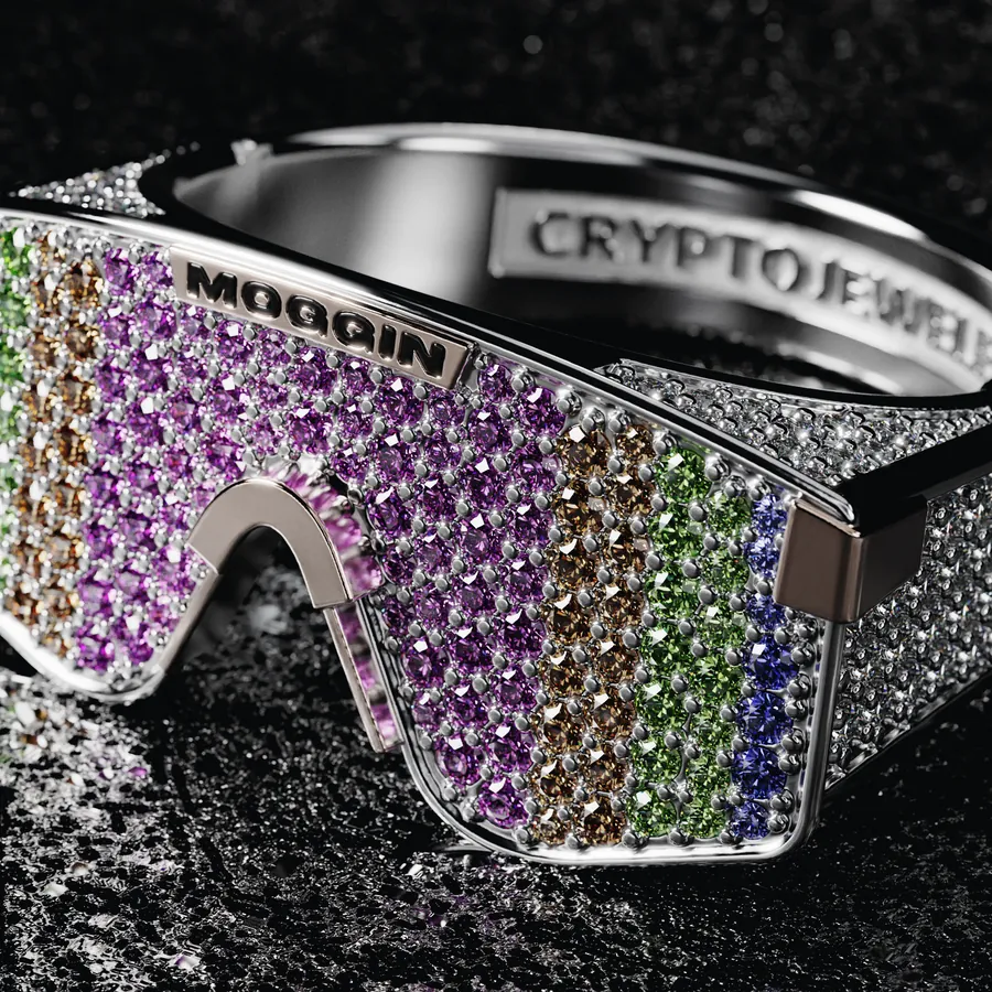 The MOG visor ring in white gold, pavé set with multicolored stones across the lens