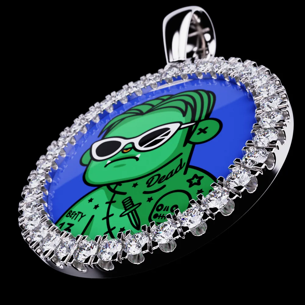 A M3MORIES pendant with a green cartoon character set in the centerpiece